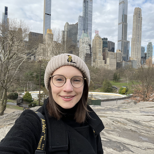 Niamh in Central Park with the NYC skyline
